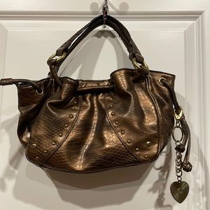 Bronze coloured purse. Nine West
